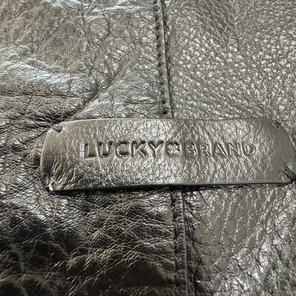 Lucky Brand Black Pebbled Leather Studded Flap Backpack Bag